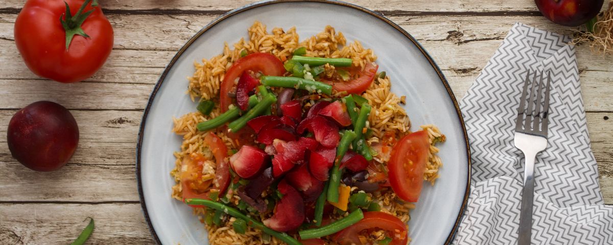 Brown rice, green bean, plum and tomato salad
